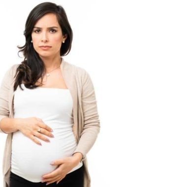 pregnant woman looking serious