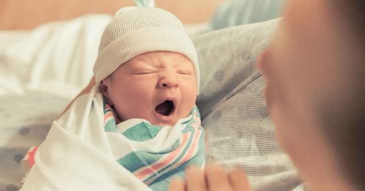 newborn baby yawning