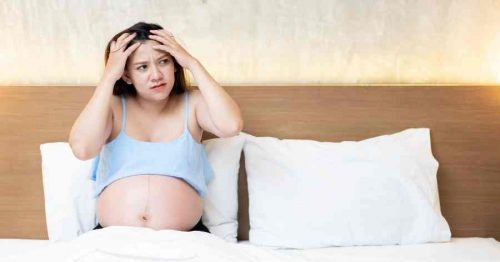 puzzled pregnant woman