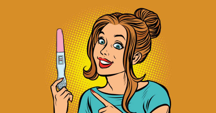 woman holding pregnancy test