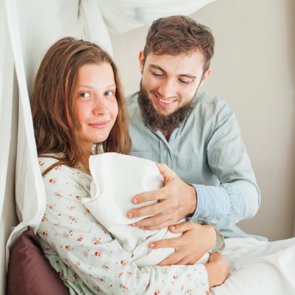 happy couple with baby