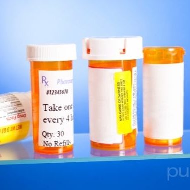 medicine bottles on shelf