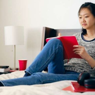 woman writing in journal