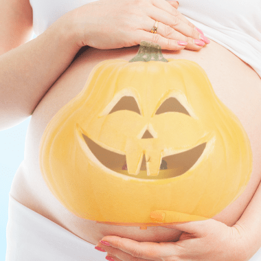 Pregnant at Halloween - belly with jack-o-lantern face.