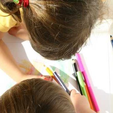 two children coloring