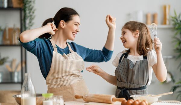 family routines course (2) (1) mom and daughter cooking and having fun