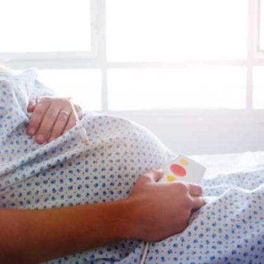 pregnant woman in a hospital bed