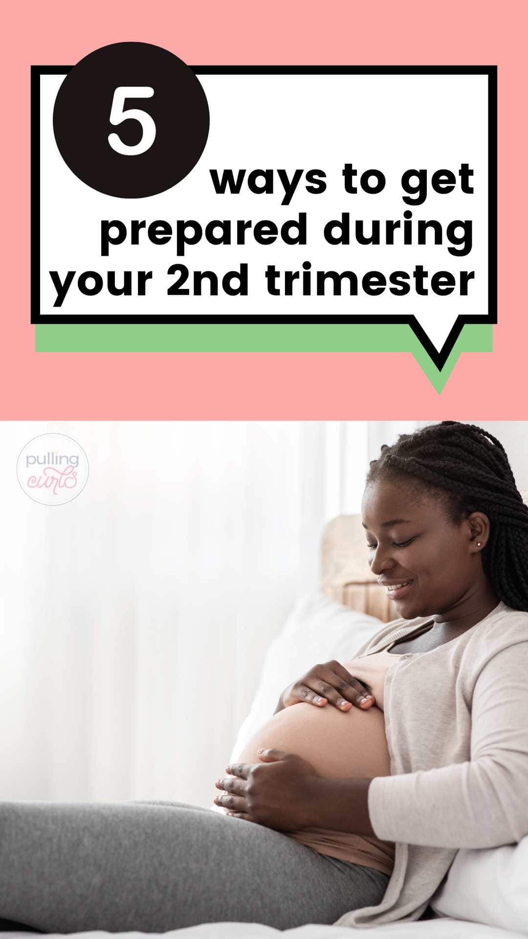 black pregnant woman holding her belly // 5 ways to get prepared dduring your 2nd trimester via @pullingcurls