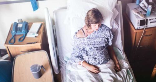 pregnant woman in bed.